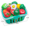 A plastic pretend play cutting set filled with colorful, sculpted fruit and vegetable toys.