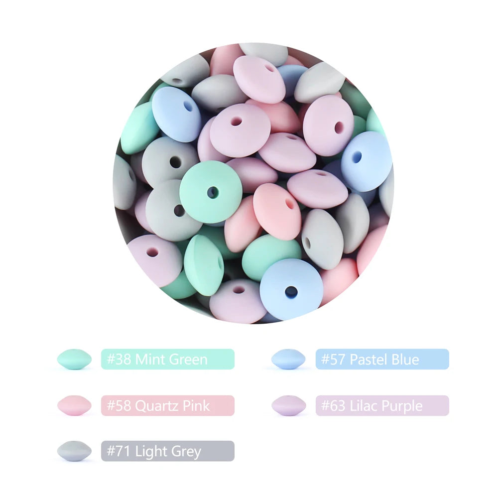 A collection of round silicone lentil beads in various pastel shades including mint green, blue, pink, and purple.
