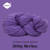 A ball of purple Merino wool yarn, hand-picked and 300g, shown against a purple background.