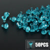 A pile of bright blue gemstone building blocks, including various shapes and sizes, with a small box showing 50 pieces.