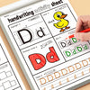 A hand is writing and coloring letters D and d on a handwriting activity sheet for children.