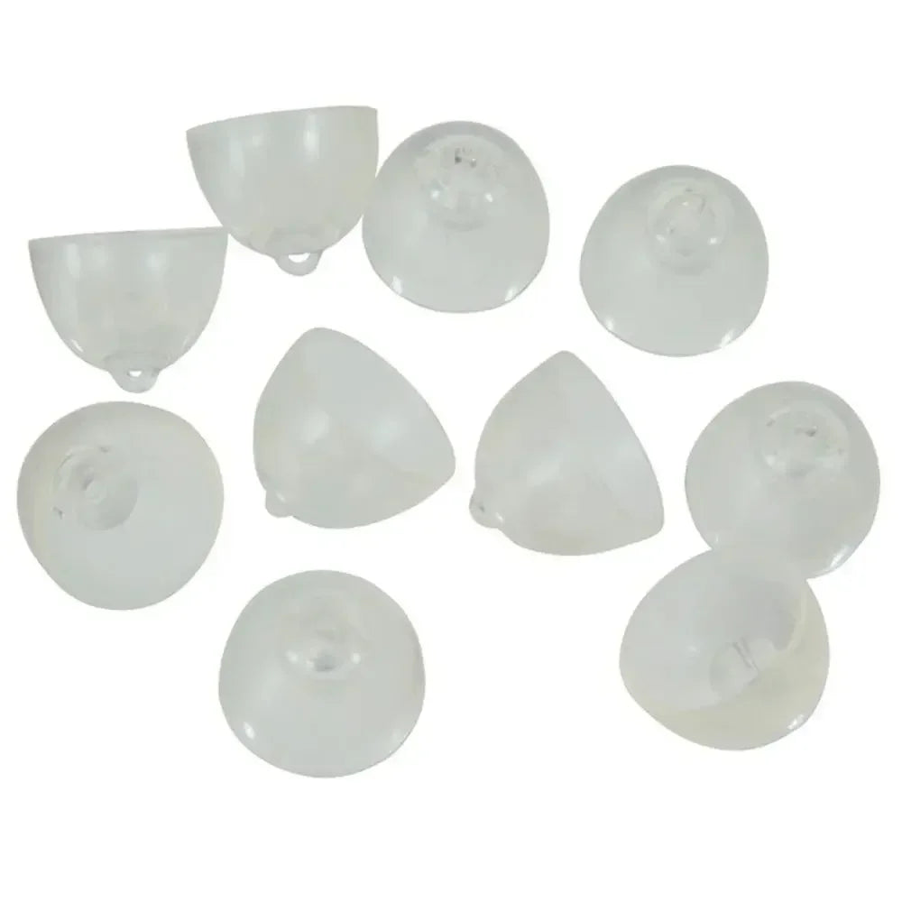 A collection of white replacement bass domes for Oticon MiniFit hearing aids.