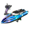 A black and blue high-speed RC boat with LED lights is shown next to its remote control.