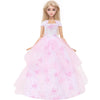 A blonde doll wearing a pink floral evening gown with a full skirt and sheer overlay.