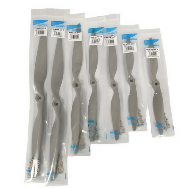 A set of gray adjustable resistance bands packaged in individual plastic sleeves for home fitness