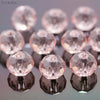 Round pink crystal glass beads used as spacers for jewelry making