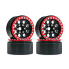 A pair of black beadlock wheels with red accents and removable hex hubs for an RC crawler.