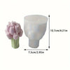 A silicone mold shaped like a pink tulip bouquet for crafting candles, plaster, or resin.