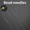 A set of seven flexible bead needles for jewelry making, including a yellow bead and red thread.