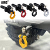 Metal trailer hitch receiver for RC crawler cars showing various colored metal clamps.