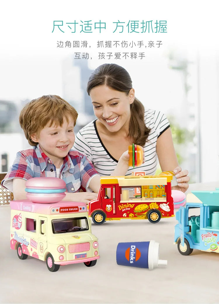 A woman is smiling while a child plays with a pink and red toy food truck car.