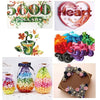 A collection of colorful origami star strips in various shades for DIY crafting and decoration.