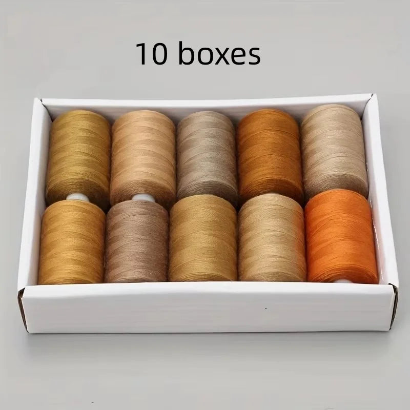 Ten boxes of polyester sewing thread in various brown shades arranged in a white box.