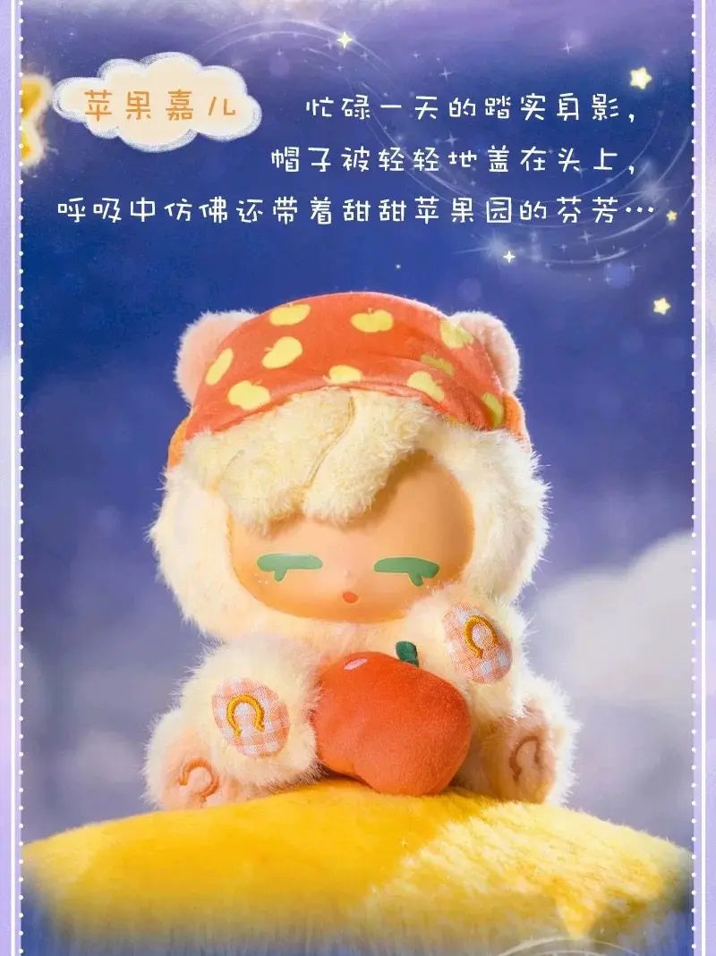 A fluffy, light-colored collectible figure resembling a pony with an orange hat and an orange apple accessory.