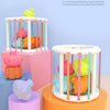 A colorful sensory sorting blocks set featuring rainbow colored shapes and balls for baby development.