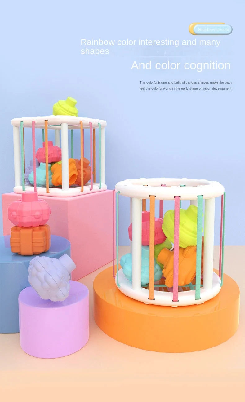 A colorful sensory sorting blocks set featuring rainbow colored shapes and balls for baby development.