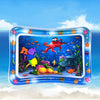 A clear inflatable baby water play mat featuring colorful sea creatures and an orange octopus.