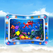 A clear inflatable baby water play mat featuring colorful sea creatures and an orange octopus.