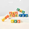 A collection of Miffy keycap pendants in various colors and shapes displayed on a white box.