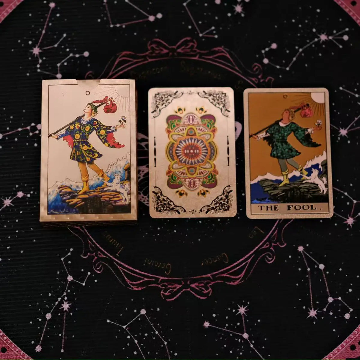 Three tarot cards featuring figures in historical attire and decorative patterns set against a dark background.