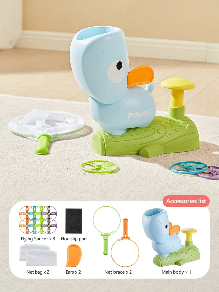 A blue elephant foot launcher toy set includes a main body, an orange foot, and two catching nets.