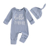 A light blue baby boy long sleeve ribbed romper and matching knit hat