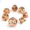 A collection of premium metal polyhedral dice in a multicolor gold finish arranged on a white background.