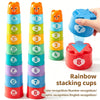 A set of eight colorful rainbow stacking cups for children used for color and number recognition games.