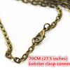 A close-up of a gold-colored chain link with a lobster clasp connection for jewelry making.