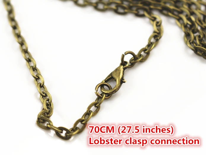 A close-up of a gold-colored chain link with a lobster clasp connection for jewelry making.