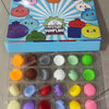 A box of maltose-filled squishy toys with a sunburst design and a tray of various colorful squishy toys.