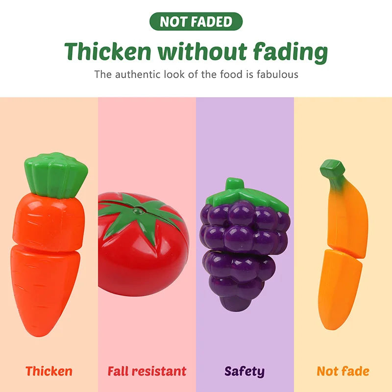 A set of plastic fruits and vegetables including a tomato, strawberry, grape, and carrot for pretend play.