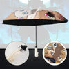 A 3-fold umbrella featuring a Demon Slayer character design, with the umbrella open and a light visible inside.