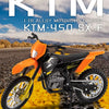 A 1:18 scale diecast model of the KTM 450 SX-F motorcycle in orange and black colors.