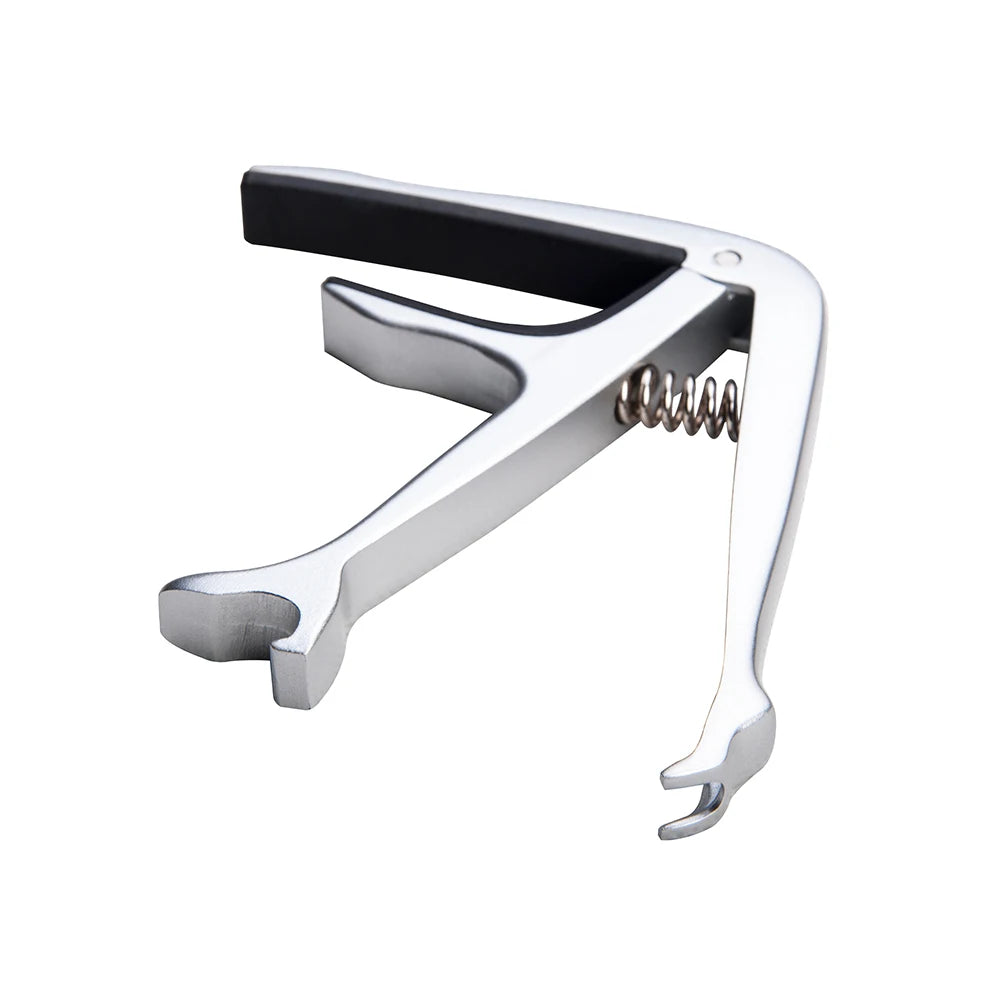 Silver zinc alloy guitar capo clamp with a black lever and metal tuning pegs