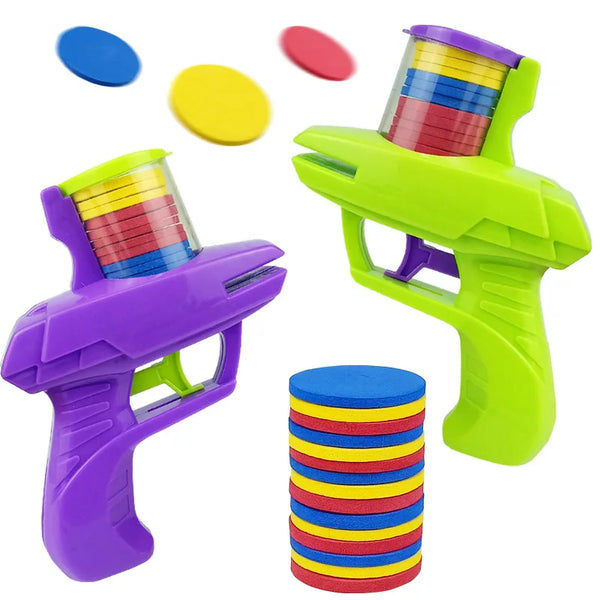 A purple foam disc launcher toy with a green body and colorful discs.