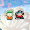 An enamel pin set featuring a cartoon character wearing a green hat and saying I'm going home.
