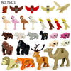 A collection of seven African wildlife animal building blocks, including a lion, elephant, giraffe, and various birds and mam