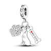 A sterling silver charm bead featuring a paw print and a silhouette of a dog.