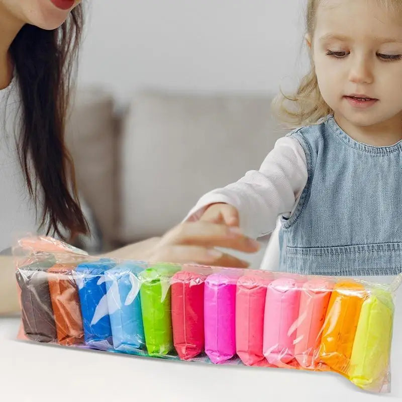 A set of colorful air dry clay modeling kits for children being used by a girl.