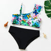 A colorful two-piece swimsuit set featuring butterfly patterns in pink, blue, and yellow on a white background.