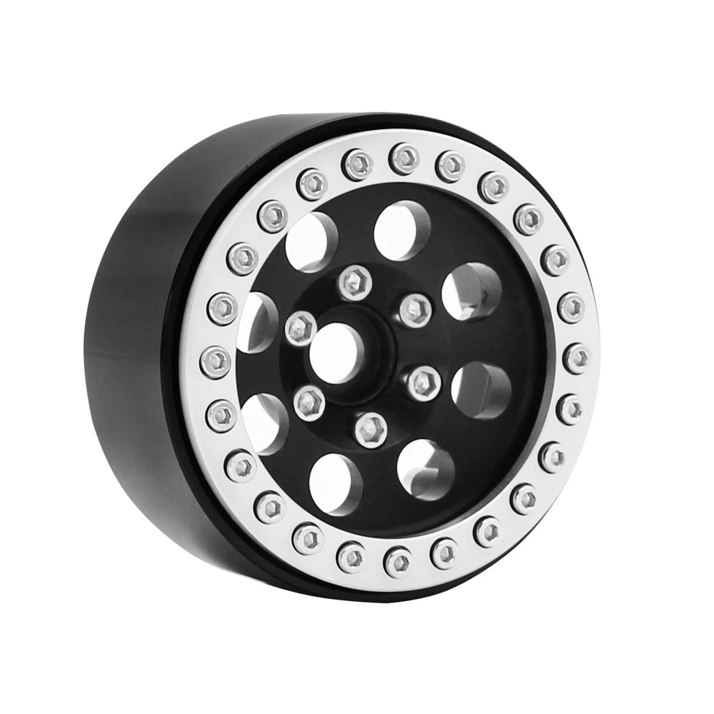 Black metal beadlock wheels for an RC crawler with a removable hex hub.