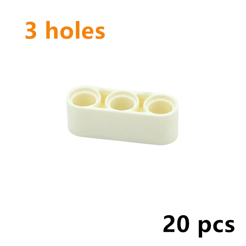 A white plastic piece with three holes, part of a 20-piece Technic liftarm beam set.