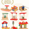 A set of wooden train track accessories including a roadblock waiting room, diesel locomotive fueling station, and various st
