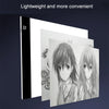 A white LED drawing copy pad is shown next to a black tablet, illustrating lightweight and convenient art supplies.