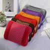 A collection of colorful, soft-covered rechargeable hot water bottles arranged in a row.