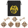 A set of bone skulls carved polyhedral dice, including a large skull and several smaller ones.