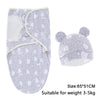 A white and gray patterned cotton newborn swaddle blanket and hat set suitable for babies weighing 3-5kg