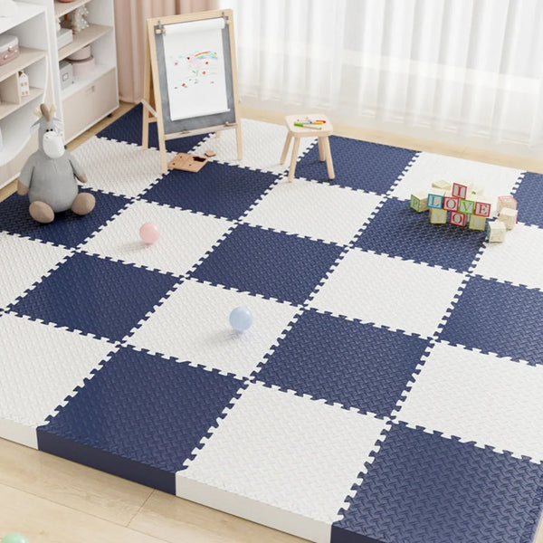A blue and white checkered play mat set with a wooden easel and a stuffed animal on a light wood floor.