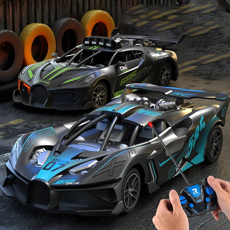 A black and green high-speed remote control drift racing car is shown on a dark surface with tires in the background.